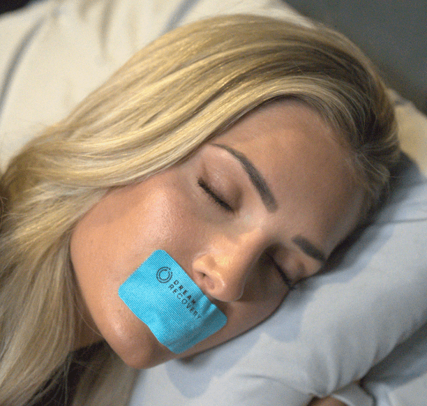 woman sleeping with blue mouth tape